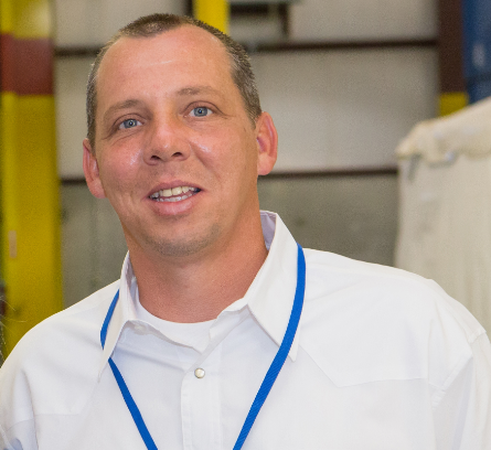 a man wearing a white shirt
