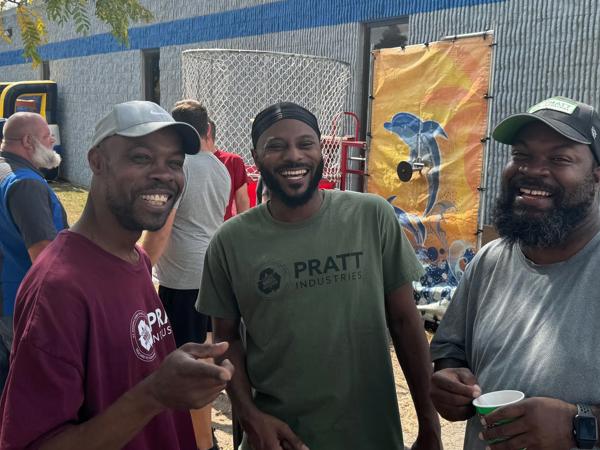 a group of men standing outside