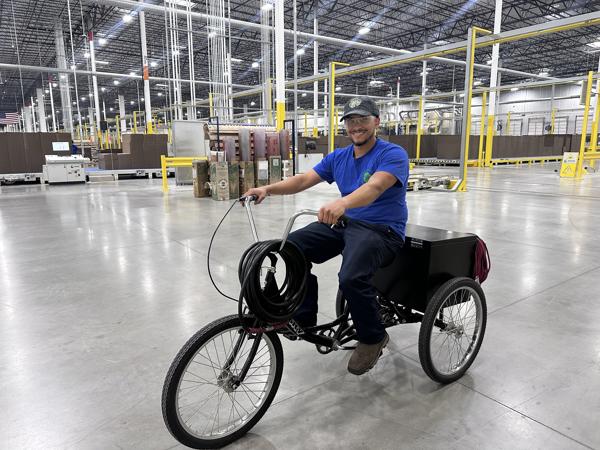 a man on a tricycle