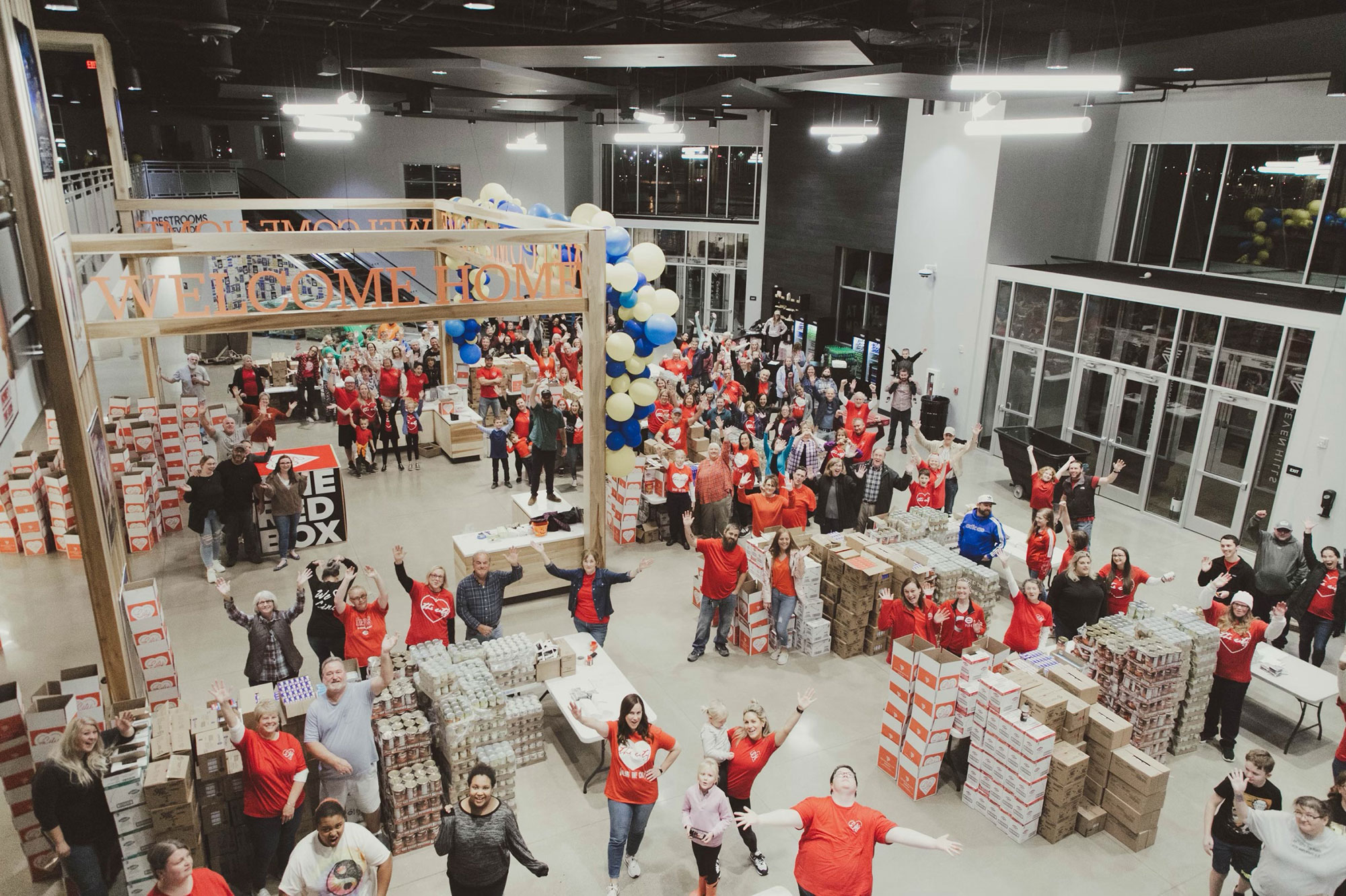 a group of people in a large room