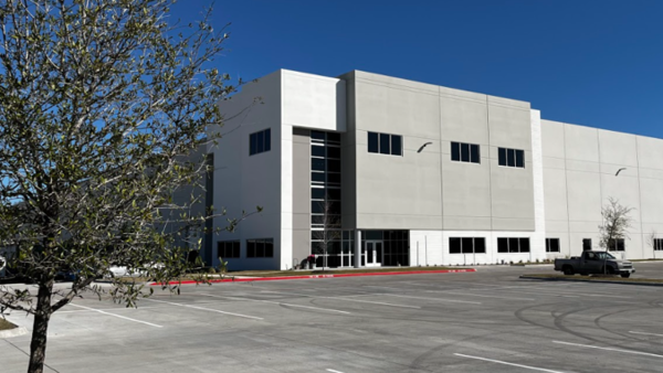 a building with a parking lot