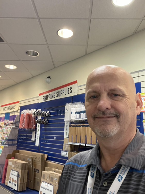 a man smiling at camera