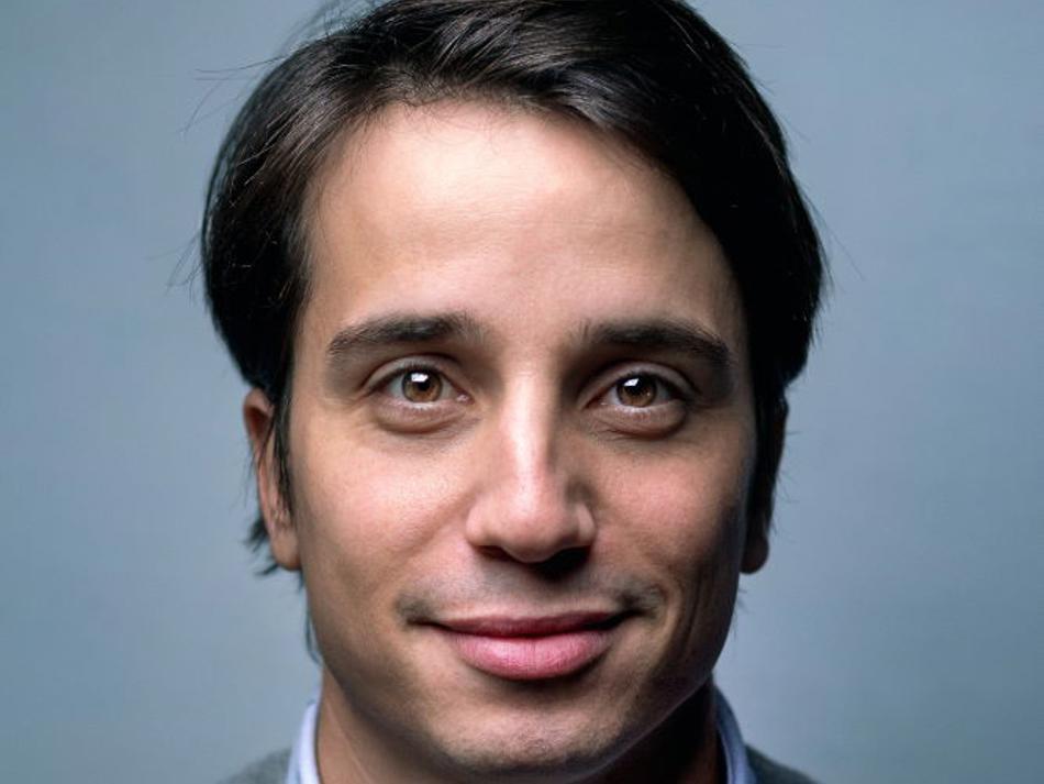 a man smiling for a picture
