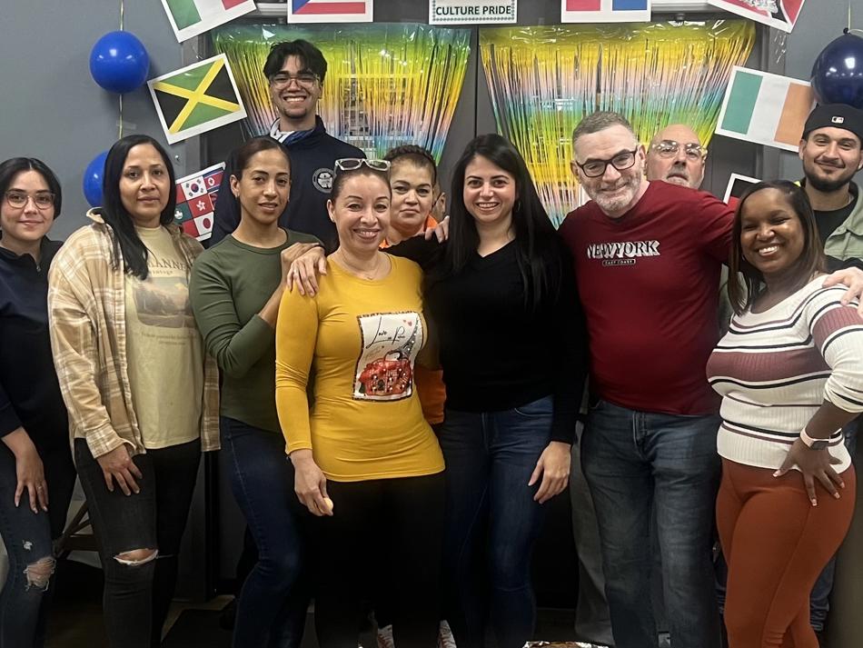 a group of people posing for a photo