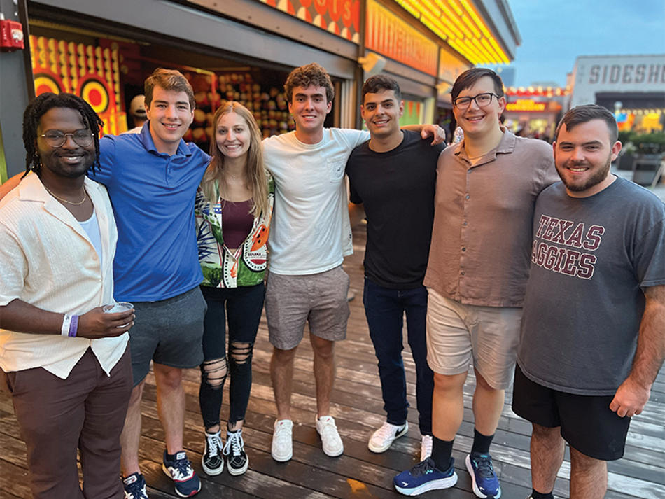 a group of people posing for a photo