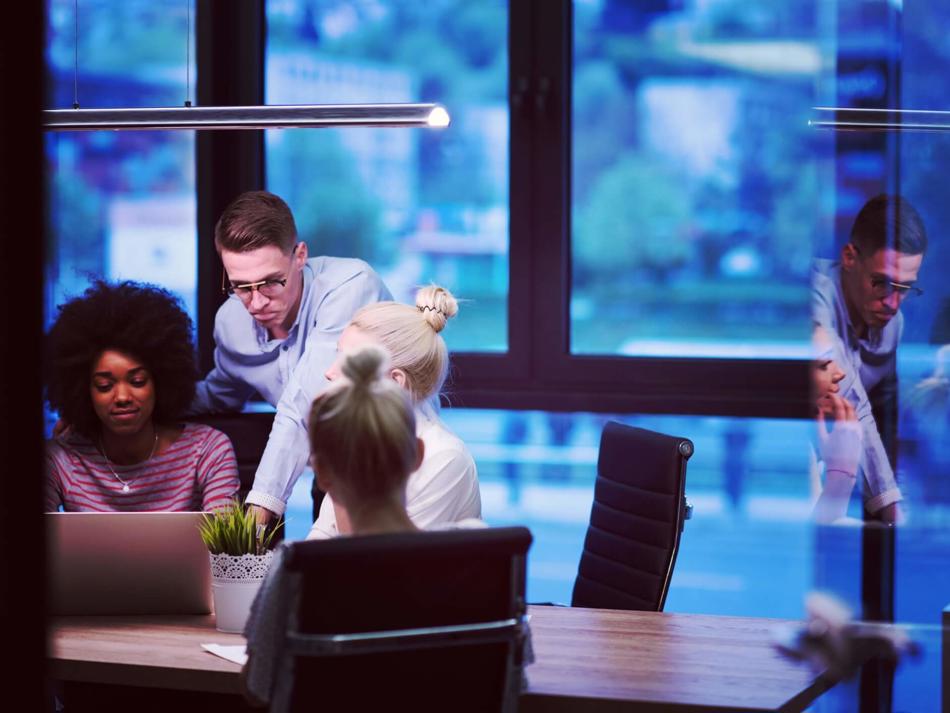 a group of people in an office