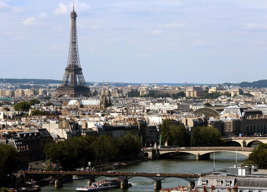 a city with a bridge and a tower