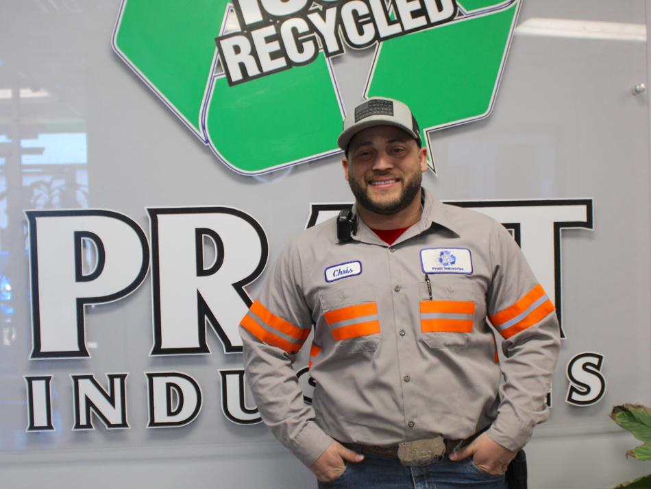 a man standing in front of a sign