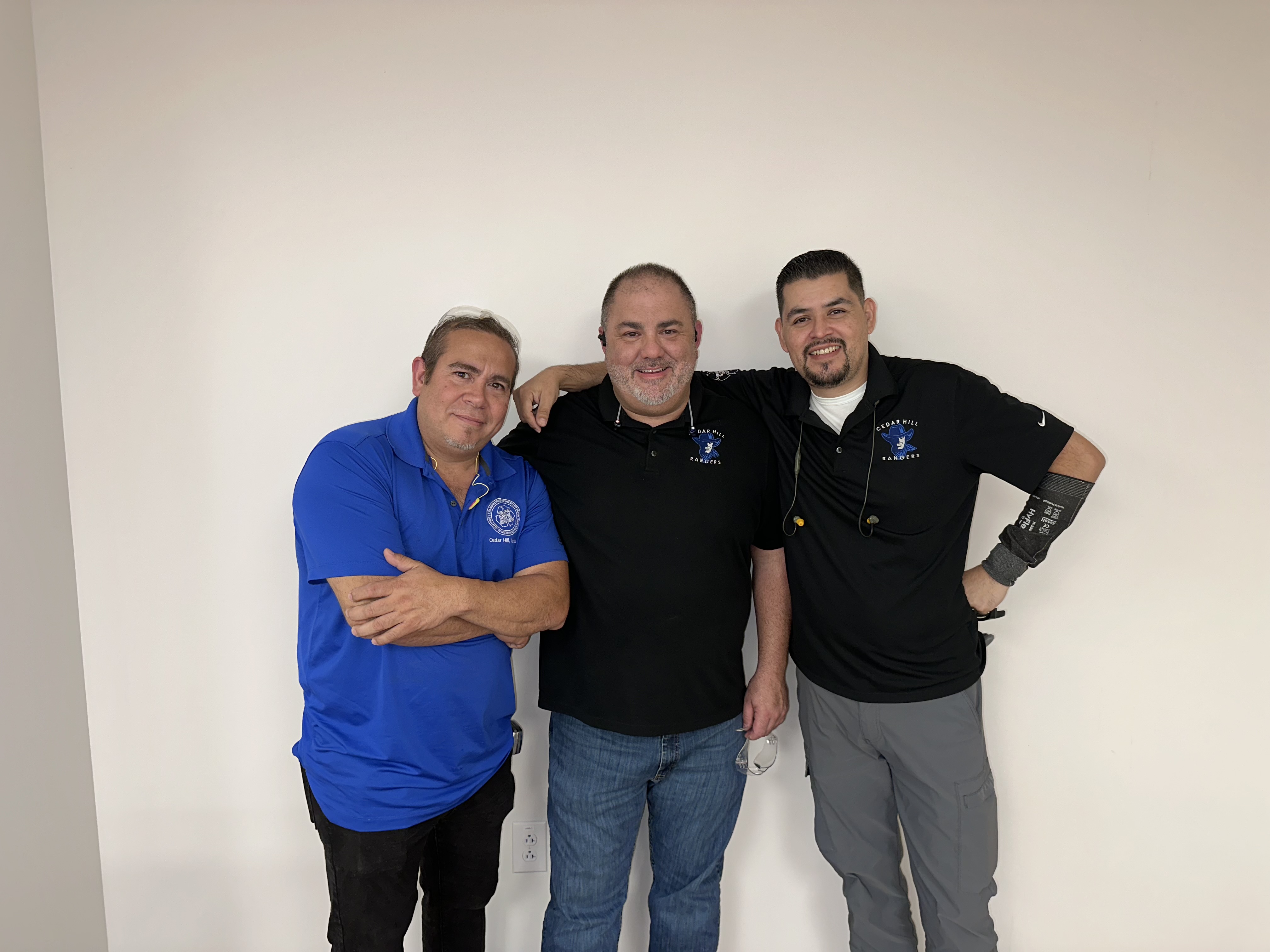 a group of men posing for a picture